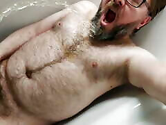 Some solo chastity watersports in the bath for this piss thirsty locked bear Some solo chastity watersports in the bath for this piss thirsty locked bear