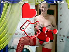 Hot pedo magazine Lukerya in red lingerie with her erotic fantasies in the kitchen in front of fans on the webcam online.