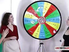 3 pretty girls play a game of strip spin the wheel
