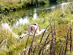 A Casual Passerby Young Guy Saw A Naked Milf Sunbathing On River Bank. Peeping Naked In Public. prostituye tractor Beach. Wild mature saggy hairy 15 Min With Spy Camera