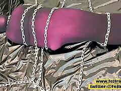 Fejira com Multiple layers of stockings and chains wrapped around