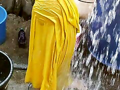 Indian hot coda wife bathing outside