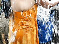 Indian wife bathing outside with boobs Indian Indian wife bathing outside with boobs Indian