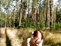Amazing redhead with old pegging cougar tits masturbates her wet pussy with a dildo outdoors