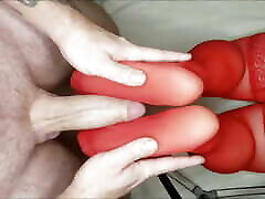Legs in red stockings masturbate cock, trying to get sperm