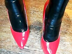Alice Latexy models in stilettos and black and red latex aka Latexdesires