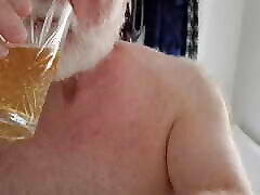 My morning piss in a crystal glass and letting it dribble down my beard
