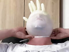BHDL - LATEXGLOVE BREATHPLAY - ZIPTIED TO HEAD AND SOMETHING SPARKLING -