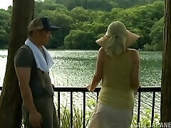 Plump Asian with big tits fingering hairy cunt in tub outdoor