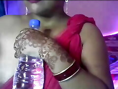 Hot desi sexy girl opens her clothes and shows her jugs and puffies.