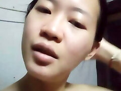 Chinese girl is bored at home alone