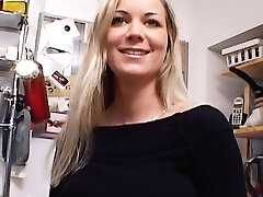Unbelievable German MILF with huge boobs dildoing her shaved beaver in the kitchen