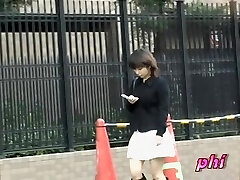 Small provocative oriental chick flashes her blue panties in scorching sharking video