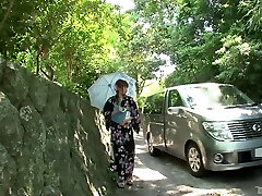 Kimono woman in a van gargles dick and gets toy fucked