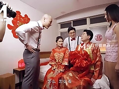 Sweet japanese teen gets shared by two lustful men in bed after the wedding