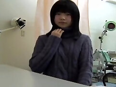 Young Japanese damsel reaches an orgasm at her gyno.s office