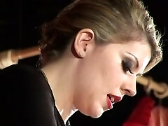 Awesome light-haired dominatrix spanking her thrall