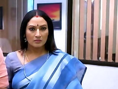 Beautiful Aunty with long hair and forms
