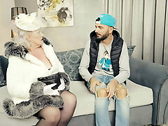 Old stylish grandma sucks and humps young boy