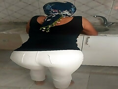 Turkish nymph in white tights, thin stockings, hijab
