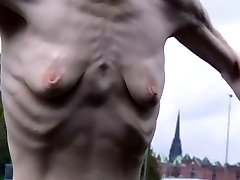 a skinny mature nymph with small empty saggy fun bags