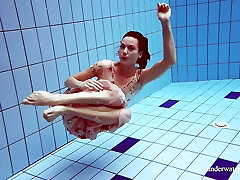 Martina gorgeous redhead teenie big tits swimming