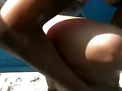 Voyeuring great wooly pussy in the beach change cabin