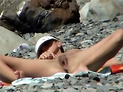 Gal mounted on a beach