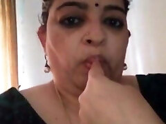 Desi Aunty showing how to suck Dick...