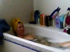 mother masturbates in bath