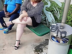 I lifted my mini miniskirt and opened my legs for a stranger at the bus stop to rub my pussy through my panty
