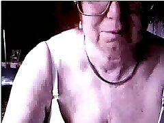Ugly 4 eyed granny from Germany exposes her time worn labia on webcam