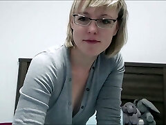 Hot Mature Blonde with Glasses and Short Hair Helping Folks Real Hotty