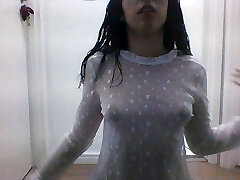 Girl in semitransparent clothes masturbating