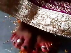 Indian dominatrix has her feet worshipped by slave