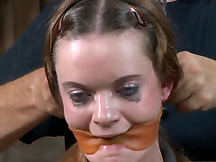 Skanky red-haired whore cries getting her diminutive tits smacked hard with rod