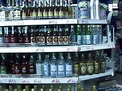 Cashier gets his cock sucked by a customer before fucking her in the store