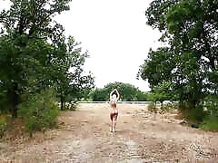 Slave punishment - clit chain demonstration in front of the highway