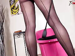 Dominant Goddess Ambra controls your orgasm while smoking with perfect back seams nylons