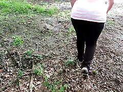 Heavy tit slapping behind the cabin in the woods