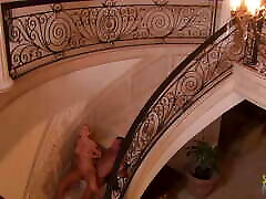 Busty blonde MILF fucking with a friend on the stairs