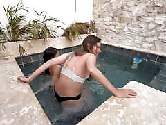 Two hot lesbians masturbate in a public swimming pool, afraid of being discovered.