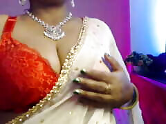 Sexy hot girl opens her clothes and presses her boobs for her sex thirst.