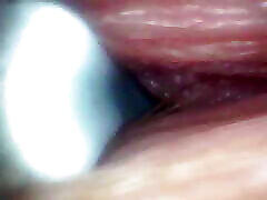 Recorded close-up of a woman&039;s G-spot the camera probe goes deep into her