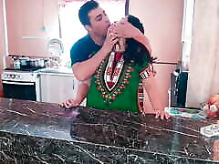 stepson surprises his Indian stepmother with a hot fuck in the kitchen