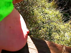 Titslapping on a bridge