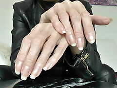 Leather Mistress Shows Her Beautiful Hands