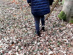 Spanking her tits and ass in the woods