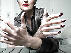 Long Dark Red Fingernails and Fist Hand