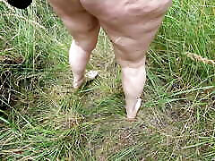 Clamping my pussy I walk naked through the forest with it